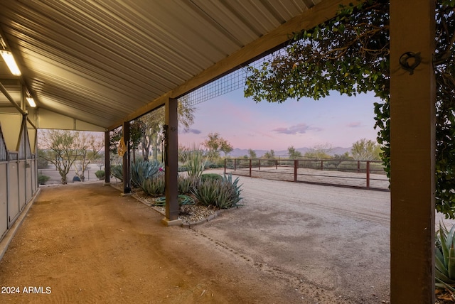 view of patio terrace at dusk