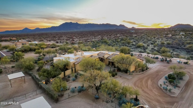 aerial view at dusk with a mountain view