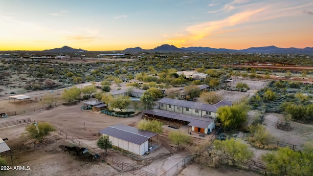 aerial view at dusk with a mountain view