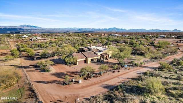 drone / aerial view featuring a mountain view