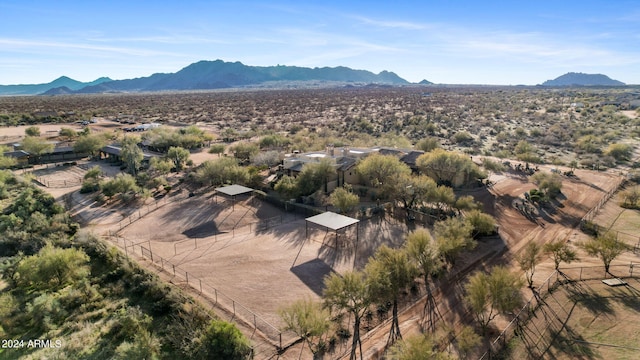 birds eye view of property with a mountain view