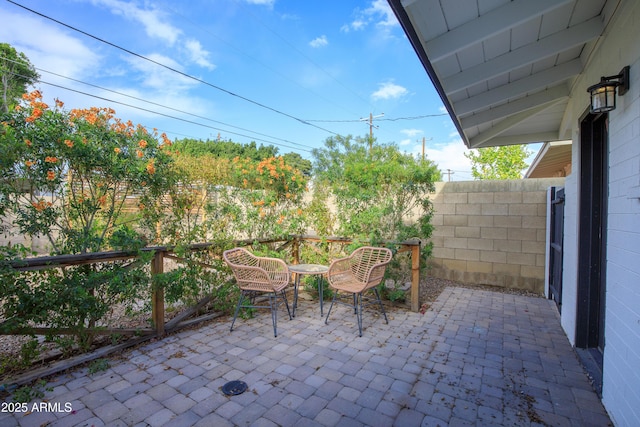 view of patio with fence