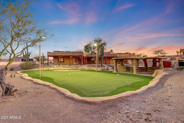 28758 N Ashbrook Ln, San Tan Valley, AZ 85144 - rear view of property featuring an area to practice putting and a patio