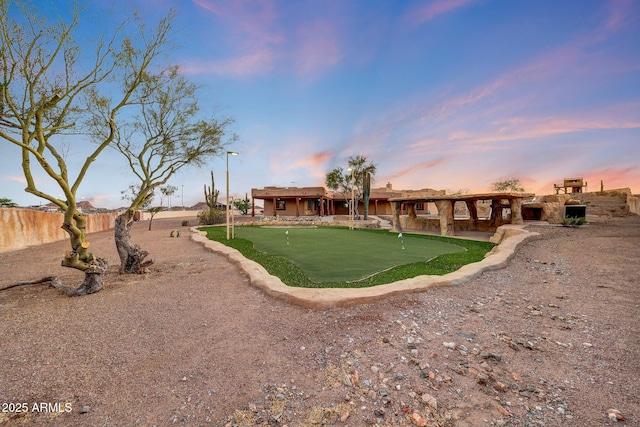 28758 N Ashbrook Ln, San Tan Valley, AZ 85144 - rear view of property featuring a putting area