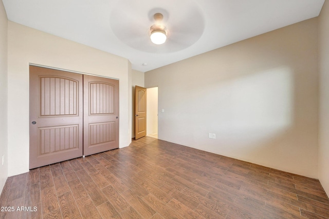 28758 N Ashbrook Ln, San Tan Valley, AZ 85144 - unfurnished bedroom with wood finished floors, a closet, and a ceiling fan