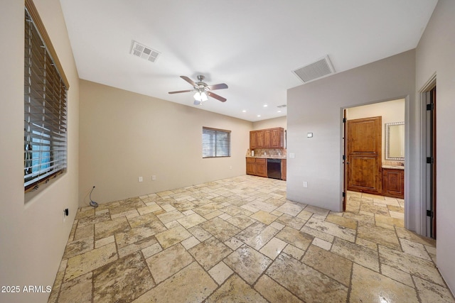 28758 N Ashbrook Ln, San Tan Valley, AZ 85144 - unfurnished living room featuring stone tile flooring, a ceiling fan, and recessed lighting