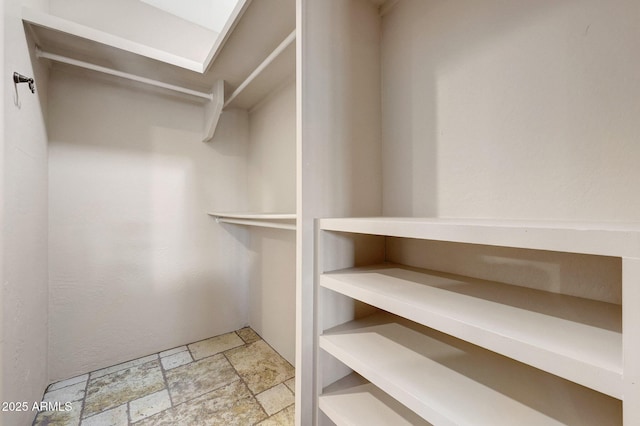 28758 N Ashbrook Ln, San Tan Valley, AZ 85144 - spacious closet with stone tile floors