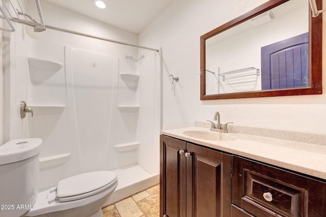 28758 N Ashbrook Ln, San Tan Valley, AZ 85144 - full bath featuring toilet, vanity, a shower, recessed lighting, and stone finish flooring