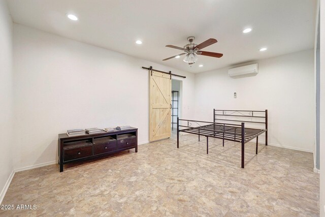 28758 N Ashbrook Ln, San Tan Valley, AZ 85144 - bedroom with an AC wall unit, a barn door, recessed lighting, baseboards, and tile patterned floors