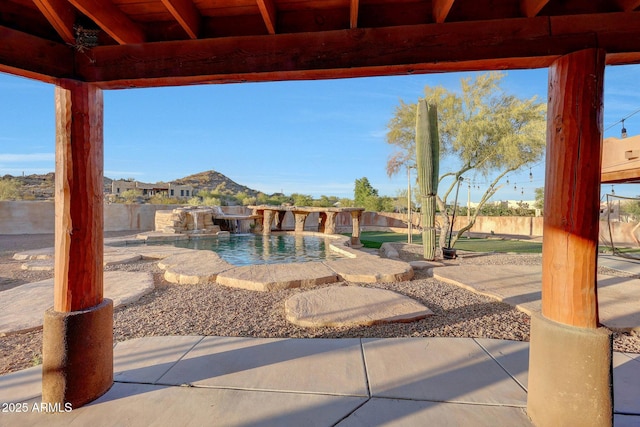 28758 N Ashbrook Ln, San Tan Valley, AZ 85144 - fenced backyard featuring an infinity pool and a patio
