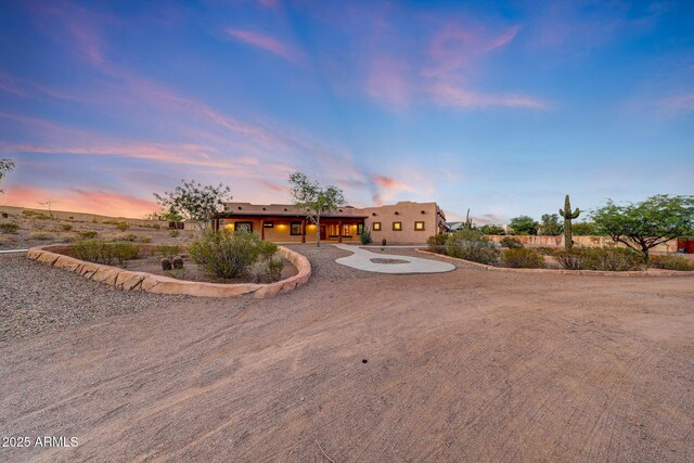 28758 N Ashbrook Ln, San Tan Valley, AZ 85144 - pueblo-style home with curved driveway