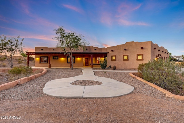 28758 N Ashbrook Ln, San Tan Valley, AZ 85144 - back of house with covered porch and stucco siding
