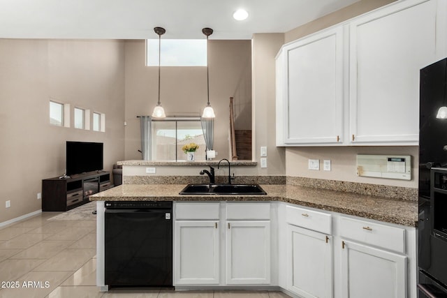 12023 W Duane Ln, Peoria, AZ 85383 - kitchen with a sink, black dishwasher, a peninsula, white cabinetry, and plenty of natural light