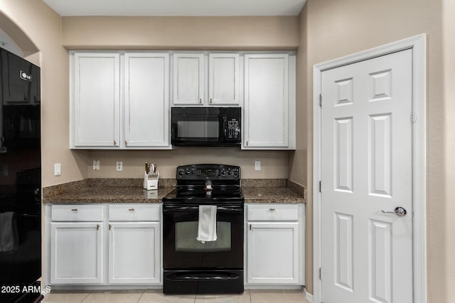 12023 W Duane Ln, Peoria, AZ 85383 - kitchen featuring black appliances, white cabinets, and dark stone counters