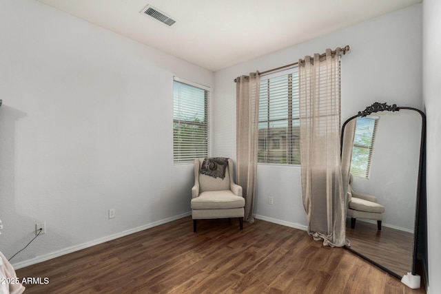 12023 W Duane Ln, Peoria, AZ 85383 - sitting room with plenty of natural light, wood finished floors, and baseboards
