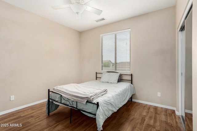 12023 W Duane Ln, Peoria, AZ 85383 - bedroom with baseboards, wood finished floors, and ceiling fan