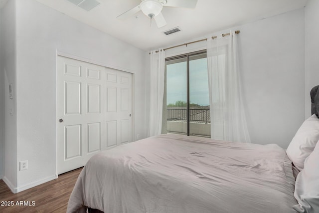 12023 W Duane Ln, Peoria, AZ 85383 - bedroom with access to exterior, wood finished floors, baseboards, ceiling fan, and a closet