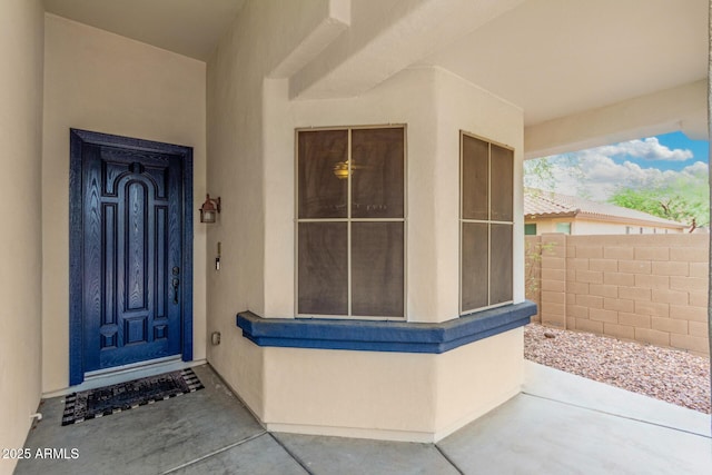 12023 W Duane Ln, Peoria, AZ 85383 - doorway to property with fence and stucco siding