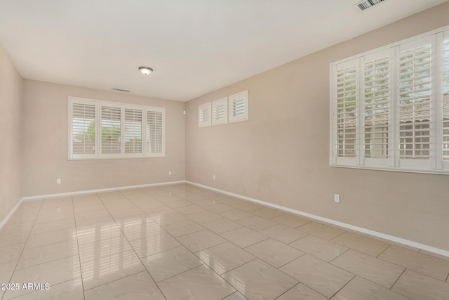 12023 W Duane Ln, Peoria, AZ 85383 - spare room with baseboards