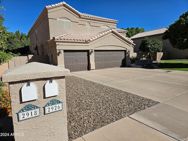 view of front of property featuring a garage