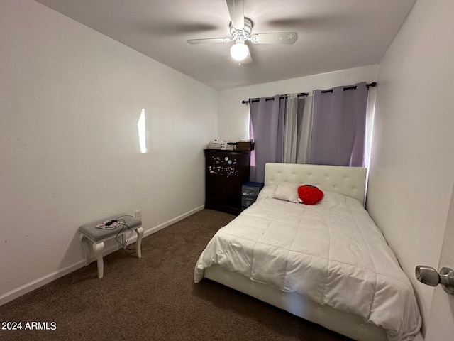 bedroom with dark carpet and ceiling fan