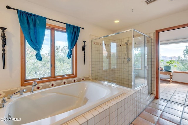 full bathroom featuring a garden tub, recessed lighting, visible vents, a shower stall, and tile patterned floors