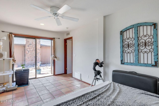 tiled bedroom with access to exterior, visible vents, and a ceiling fan