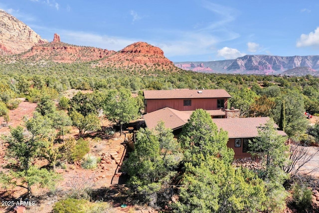 mountain view with a wooded view