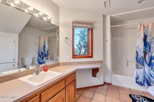 full bath with shower / bath combo, visible vents, toilet, tile patterned floors, and vanity