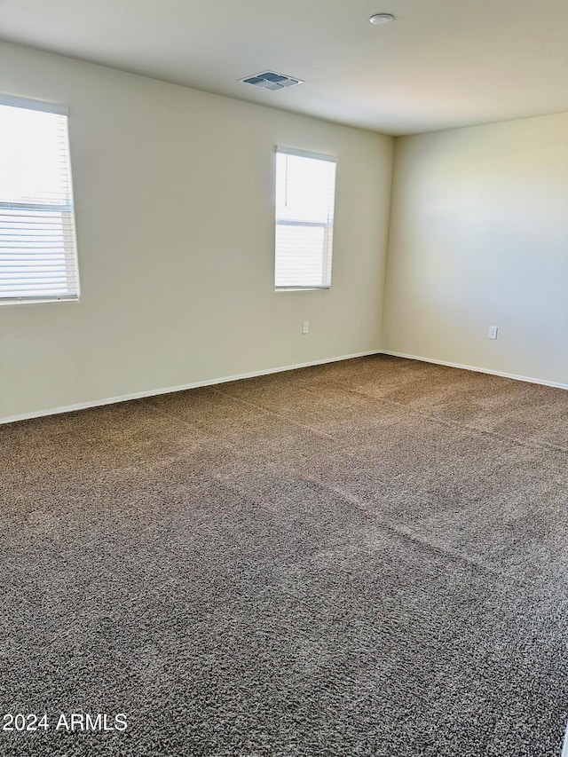 view of carpeted spare room