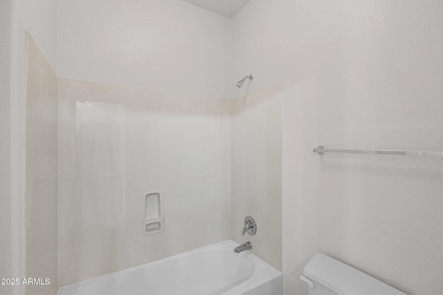 full bathroom with tub / shower combination and toilet