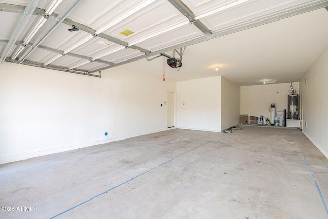 garage featuring a garage door opener and gas water heater