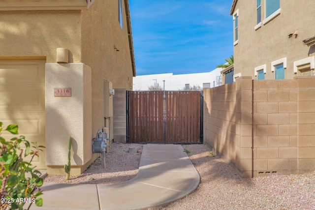 view of yard with a gate and fence