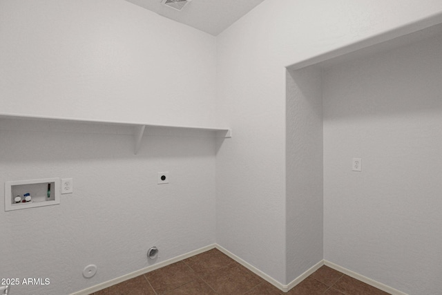 laundry room featuring washer hookup, hookup for an electric dryer, gas dryer hookup, laundry area, and baseboards