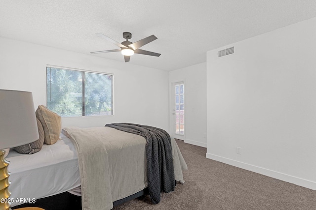 1075 E Chandler Blvd Unit 212, Chandler, AZ 85225 - carpeted bedroom featuring multiple windows and ceiling fan