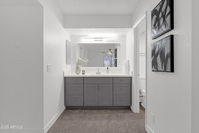 1075 E Chandler Blvd Unit 212, Chandler, AZ 85225 - bathroom with vanity, a textured ceiling, and a textured wall
