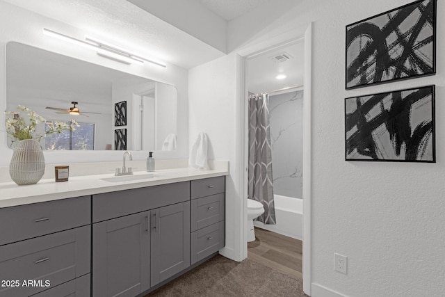 1075 E Chandler Blvd Unit 212, Chandler, AZ 85225 - full bathroom featuring vanity, a textured wall, shower / tub combo, and ceiling fan