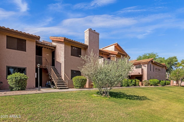 1075 E Chandler Blvd Unit 212, Chandler, AZ 85225 - view of property with stairway