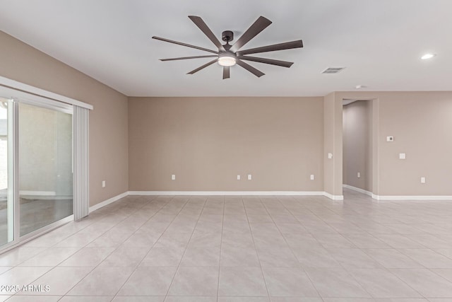 empty room with ceiling fan, visible vents, baseboards, recessed lighting, and light tile patterned flooring