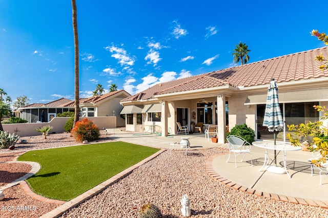 rear view of house with a patio area