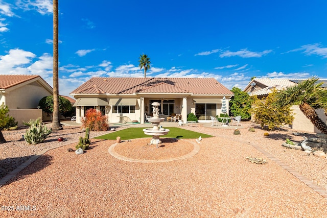 back of house featuring a patio area