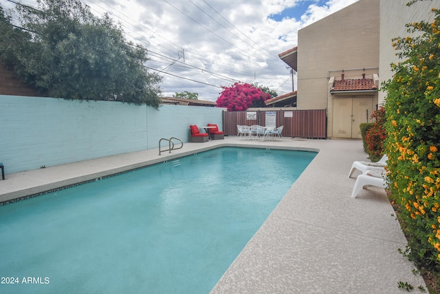 view of pool with a patio