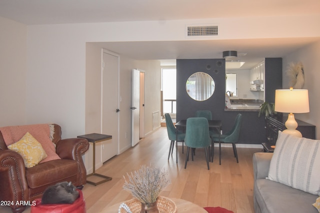 living room featuring light hardwood / wood-style floors