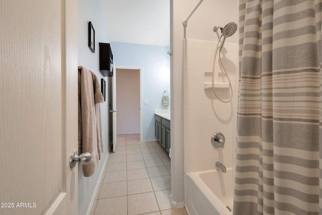 full bath with baseboards, tile patterned flooring, vanity, and shower / bathtub combination with curtain