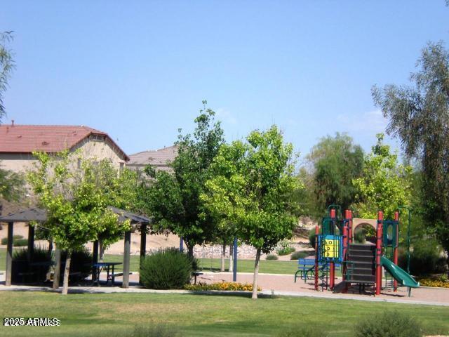 community play area with a yard