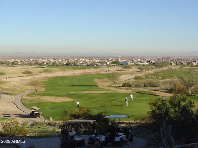 view of home's community with golf course view