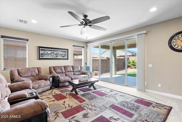 living area with visible vents, baseboards, ceiling fan, carpet flooring, and recessed lighting