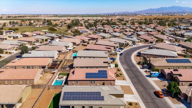 drone / aerial view featuring a mountain view and a residential view