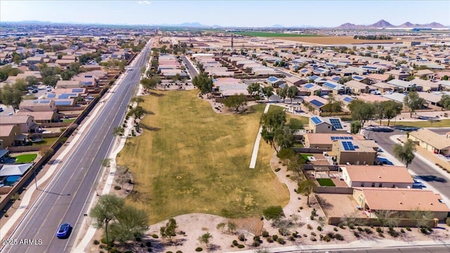 birds eye view of property featuring a mountain view and a residential view