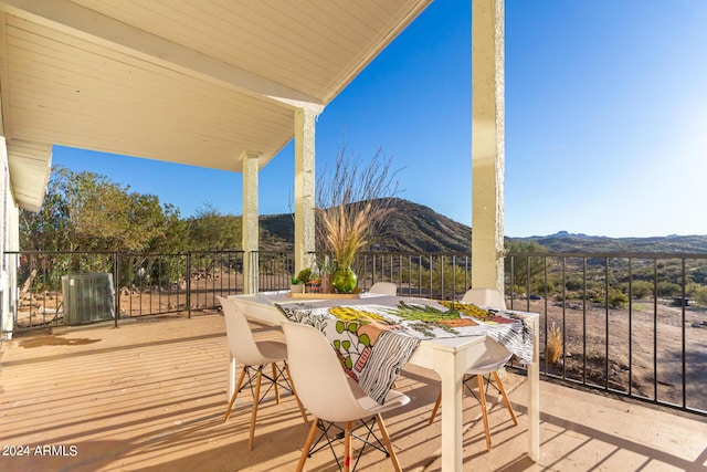 wooden terrace with a mountain view